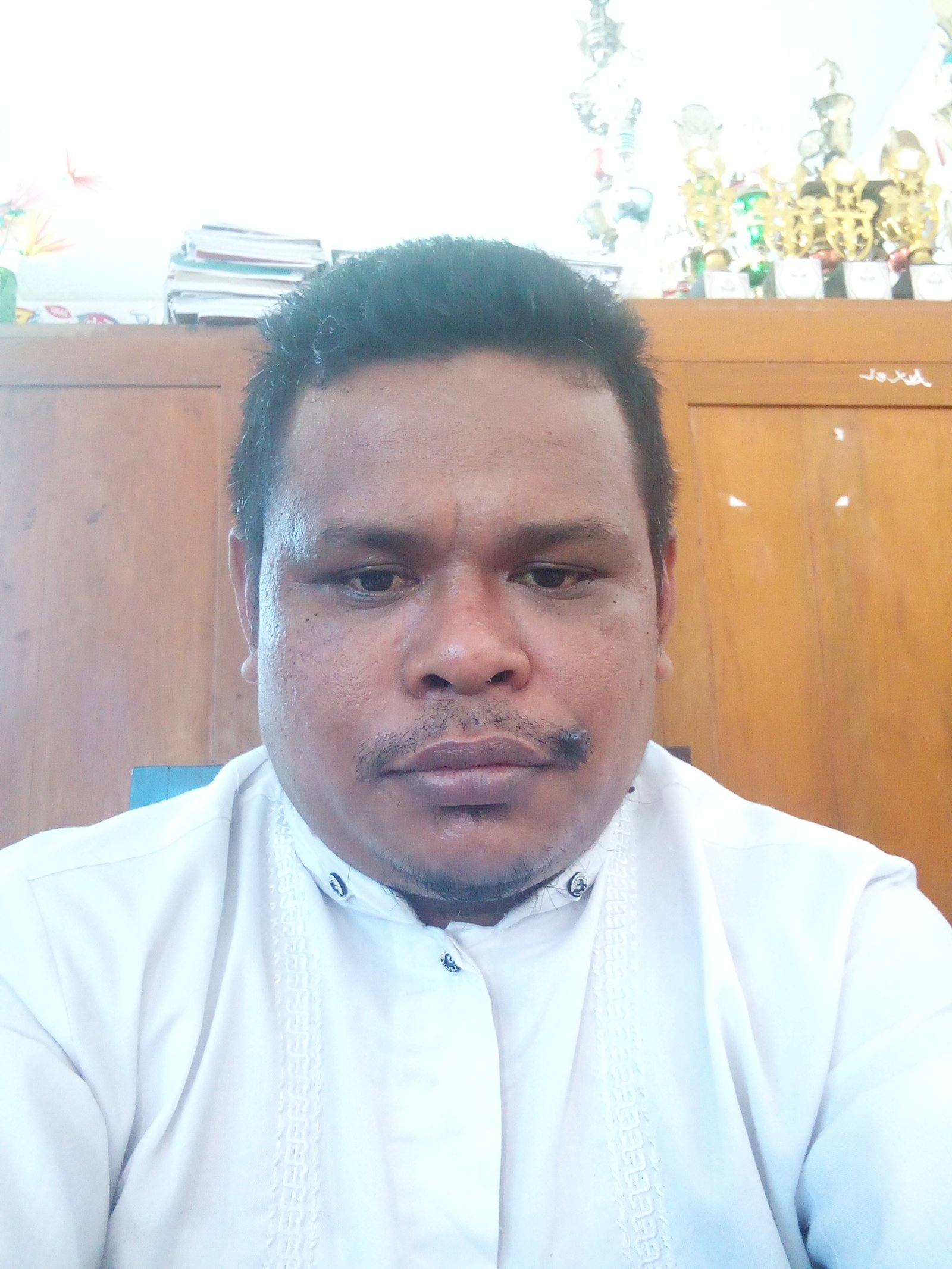 Husni J Bailusy. S. Pd.I